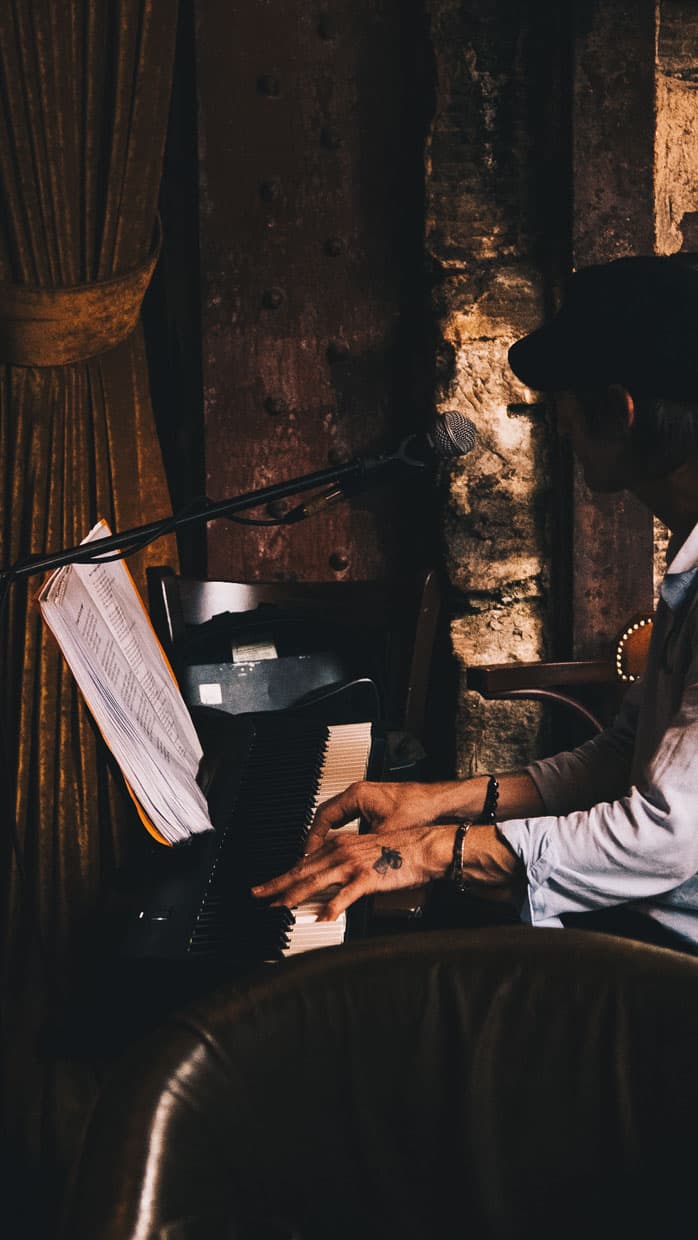 Pianist performing live music in an intimate setting at The Bellman, Merchant City Glasgow